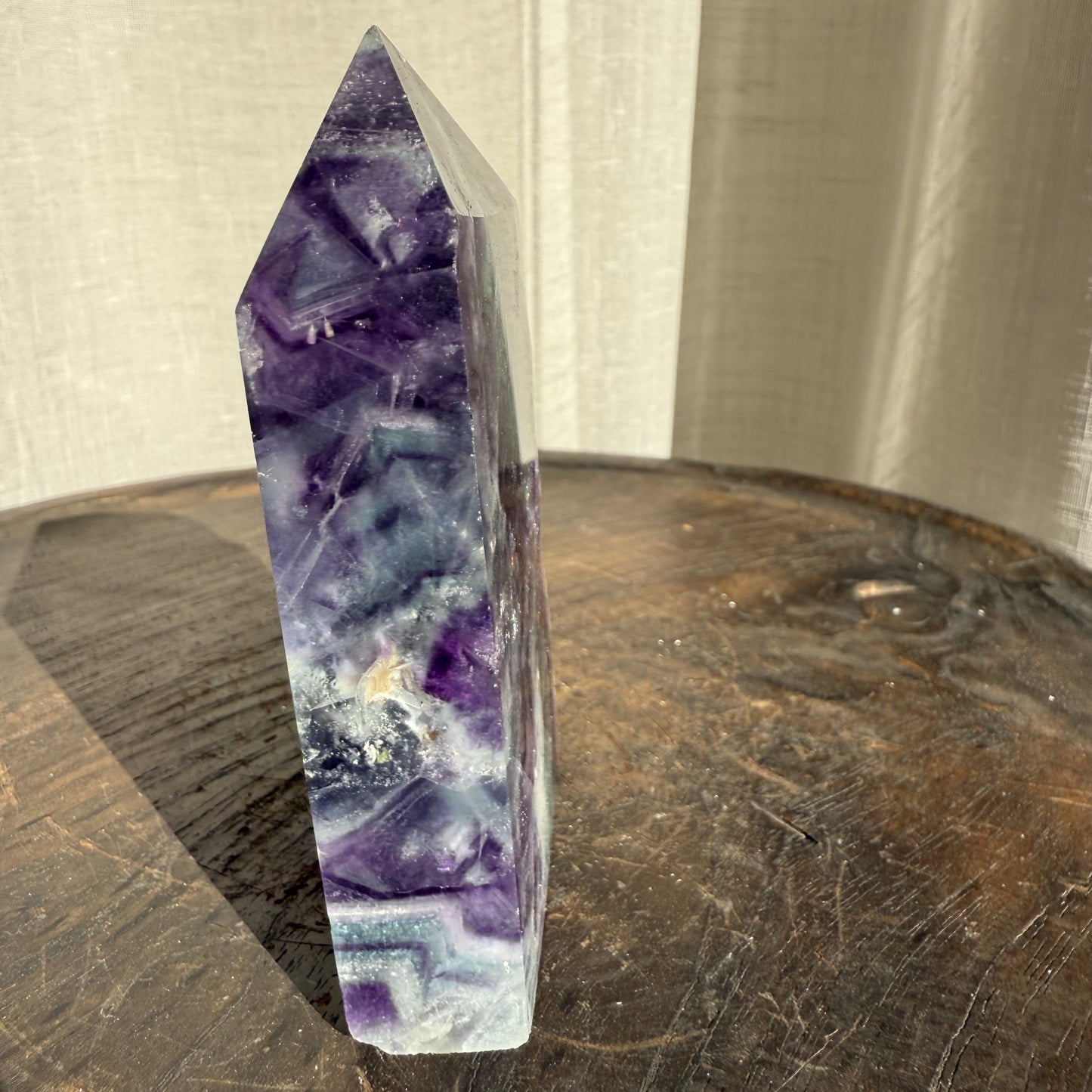 Rainbow Fluorite Wedge with raw edge 010