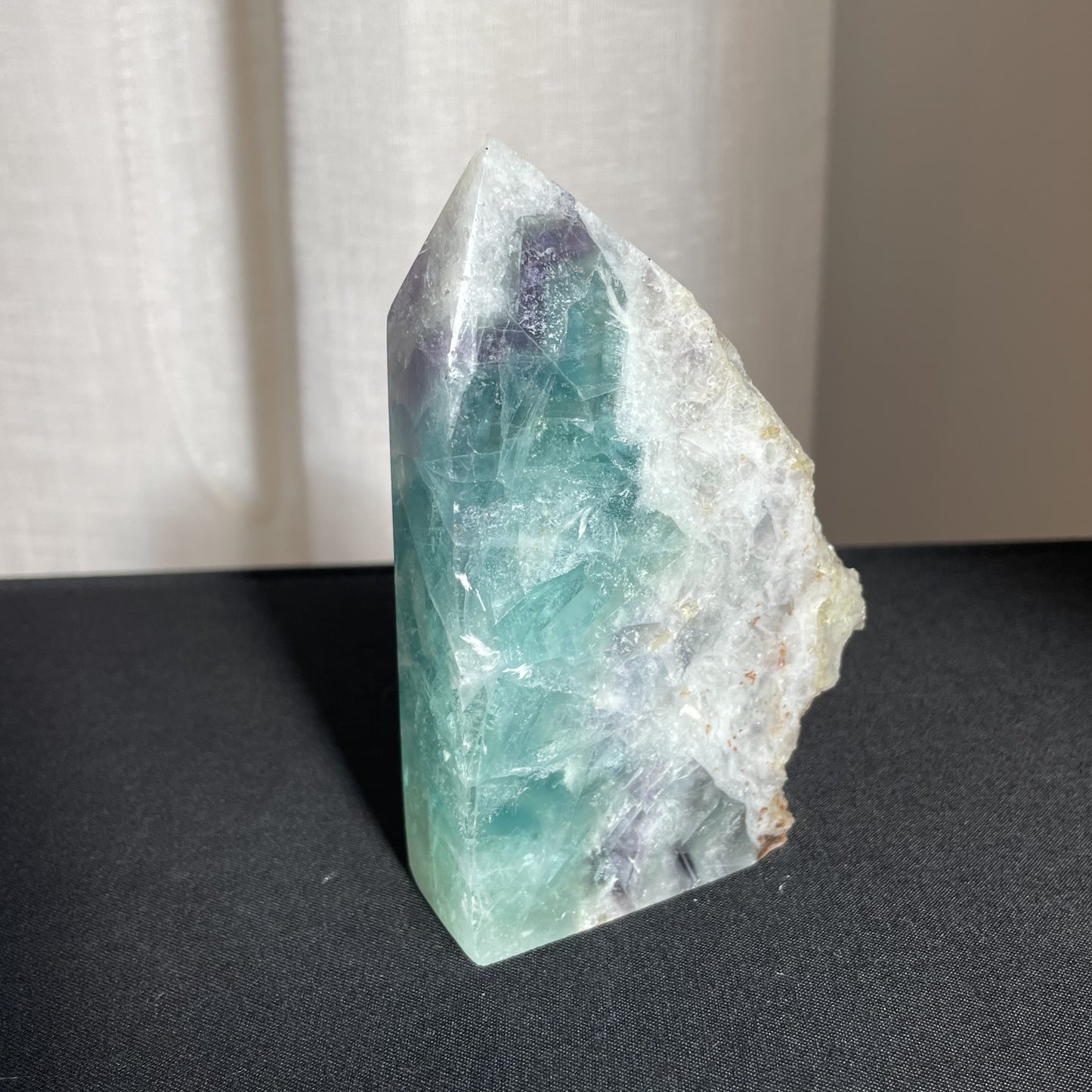 Rainbow Fluorite Wedge with raw edge